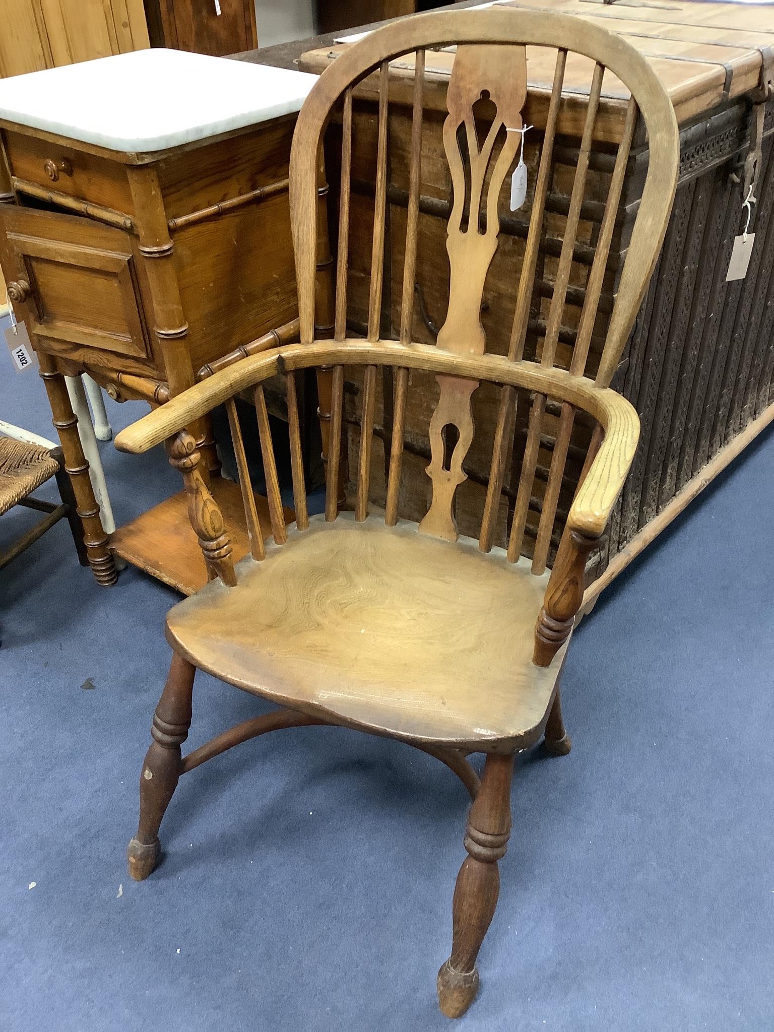 A small Victorian ash and elm Windsor elbow chair